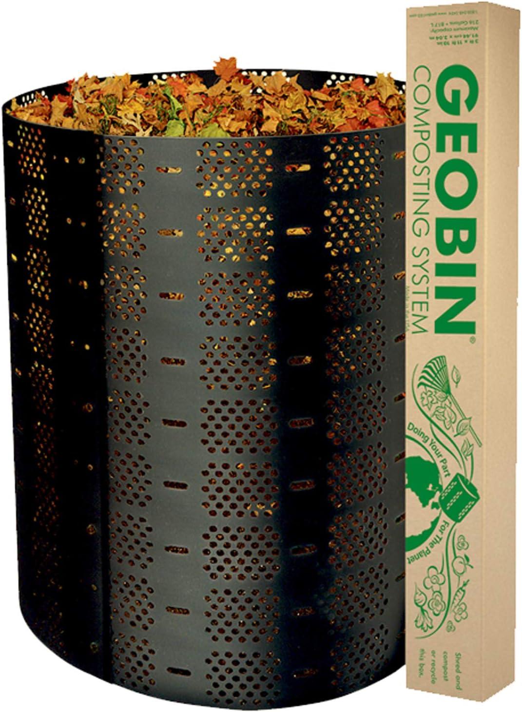 A large, black, expandable Geobin compost bin set up on a green lawn.